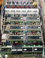 Фото смонтированного щита для  слаботочных систем, электроснабжения и освещения на базе оборудования Crestron и Schneider Electric